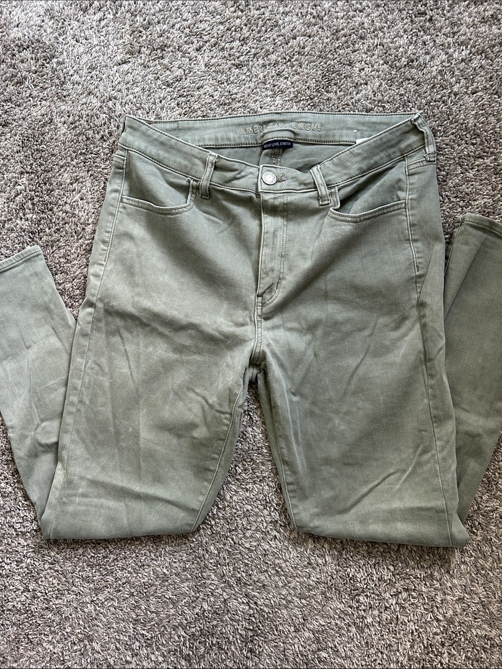 American Eagle, Hi-rise Jegging next level stretch Sz 16 regular. Light Olive.
